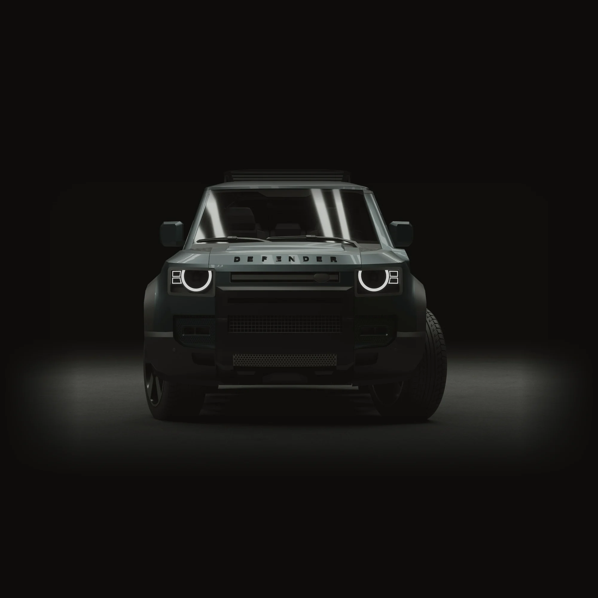 SUV tout-terrain premium gris foncé vu de face en studio sombre, phares LED ronds allumés